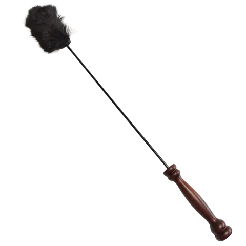 Černý králíček v rukojeti z palisandru. Cena 2500 Kč